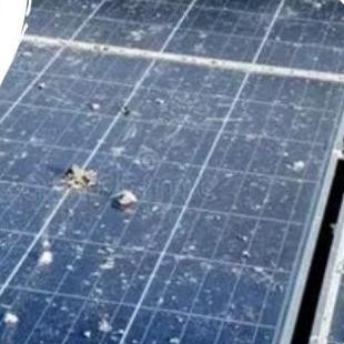 Soiled photovoltaic panels on a solar farm